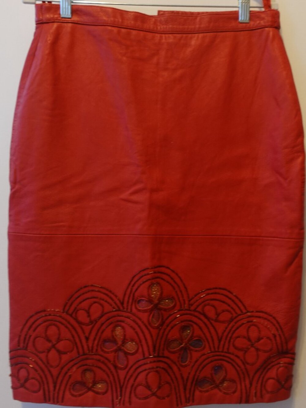 RED leather midi skirt, with beaded pattern, size waist 16"